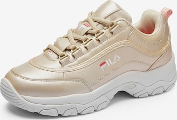 Baskets basses FILA en beige : devant