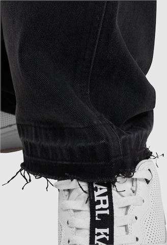 Karl Kani - Perna larga Calças de ganga em preto