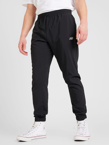 Regular Pantalon de sport 'Essentials Active' new balance en noir : devant