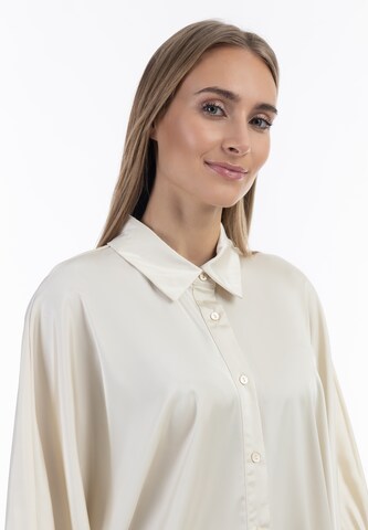 RISA - Blusa en beige