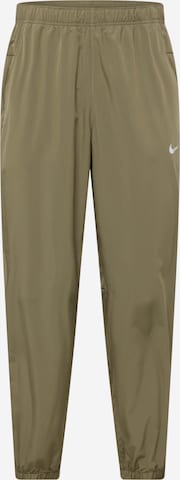 Tapered Pantaloni sport de la NIKE pe verde: față