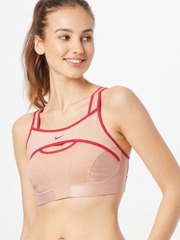 Bustier Soutien-gorge de sport 'Alpha' NIKE en rose : devant