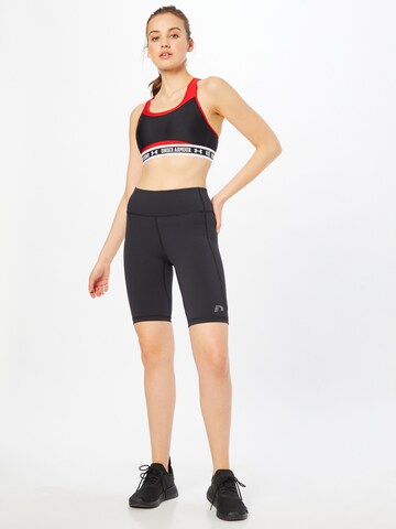 UNDER ARMOUR Bustier Sportmelltartók - fekete