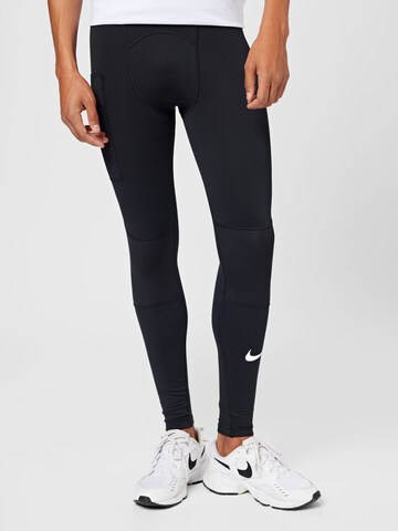 NIKE Skinny Sports trousers in Black: front