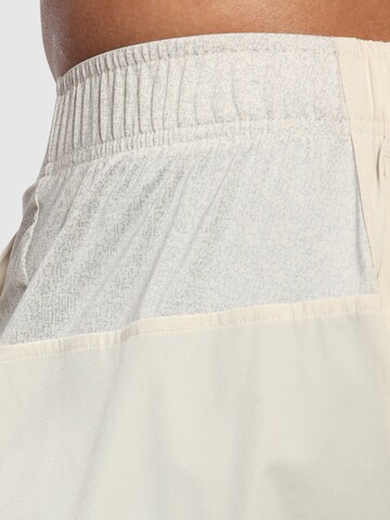 Regular Pantalon de sport ' Powerfit Triple ' Smilodox en beige