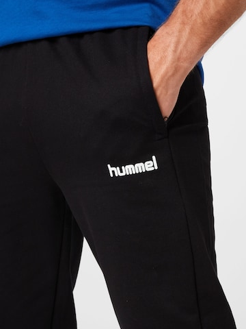 Coupe slim Pantalon de sport Hummel en noir