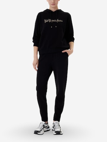 EA7 Emporio Armani - Slimfit Pantalón deportivo '7W000990 AF12502' en negro: frente