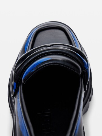 Slipper di Desigual in nero