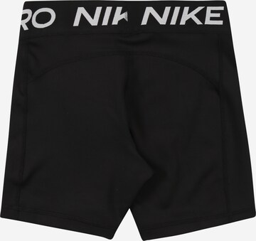 NIKE Skinny Sportshorts in Schwarz