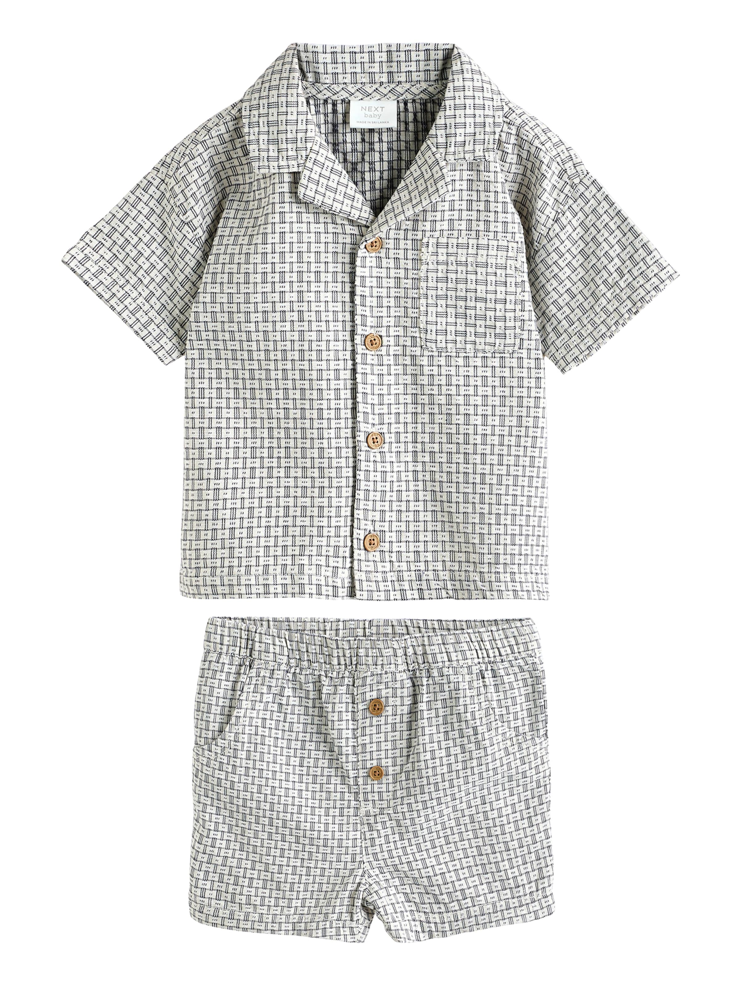 Next Set i grå: framsida