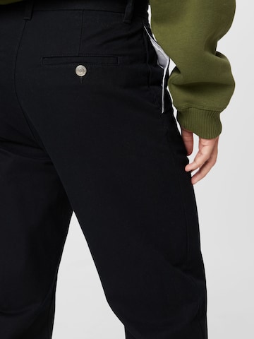 WEEKDAY Regular Trousers with creases 'Joel' in Black