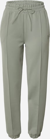 Tapered Pantaloni sportivi di HKMX in verde: frontale