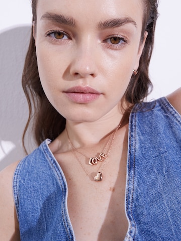 Echtzeit Earrings in Gold