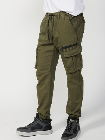 KOROSHI Tapered Cargohose in Grün