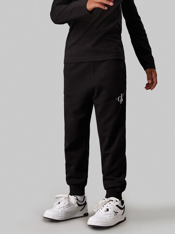Tapered Pantaloni di Calvin Klein Jeans in nero