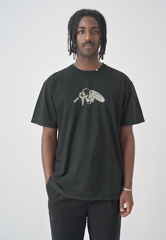 Cleptomanicx Shirt 'Artefacts' in Black: front