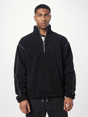 ADIDAS ORIGINALSSweater majica 'Premium Essentials Half Zip' - crna boja: prednji dio