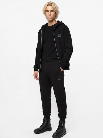KARL LAGERFELD JEANS Alt kitsenev Püksid, värv must: eest vaates