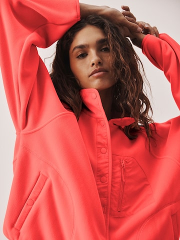 Giacca di pile di Next in rosa