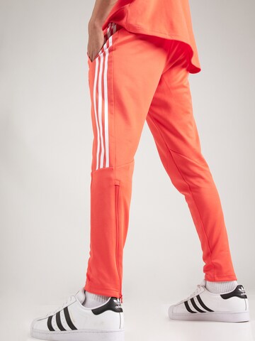 raudona ADIDAS SPORTSWEAR Siaurėjantis Sportinės kelnės 'Tiro Material Mix'