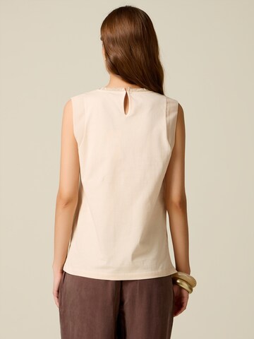 Haut oltre en blanc