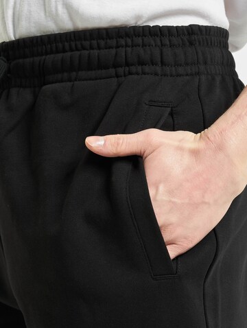 DICKIES Regular Trousers in Black