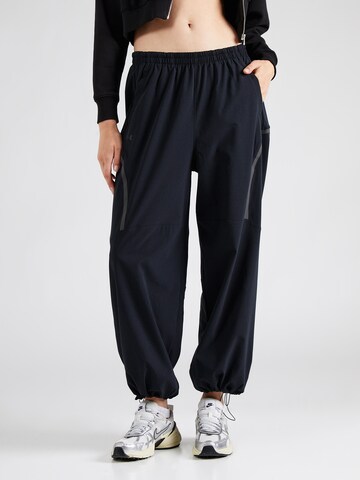 UNDER ARMOUR Tapered Παντελόνι φόρμας 'Unstoppable' σε μαύρο: μπροστά