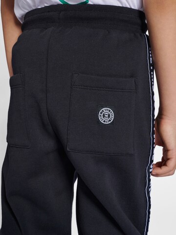 SOMETIME SOON Tapered Trousers in Black