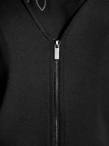 MADELEINE Gebreid vest in Zwart