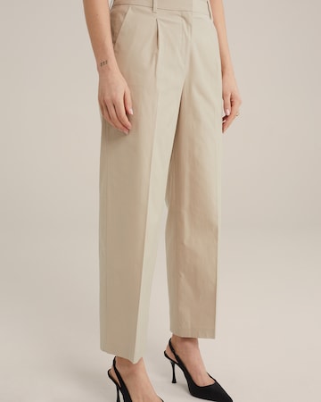 regular Pantaloni di WE Fashion in beige