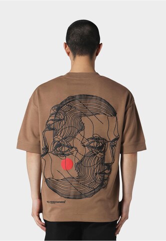 Irasuto Studios T-shirt 'Kao' i brun: framsida