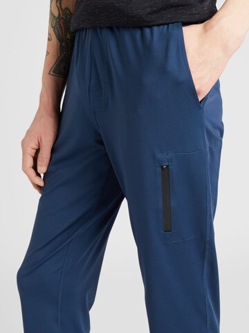 Effilé Pantalon de sport SKECHERS en bleu