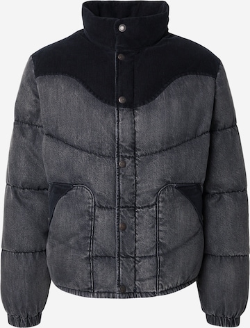 LEVI'S ® Välikausitakki 'Wild West Short Puffer Jacket' värissä musta: etupuoli