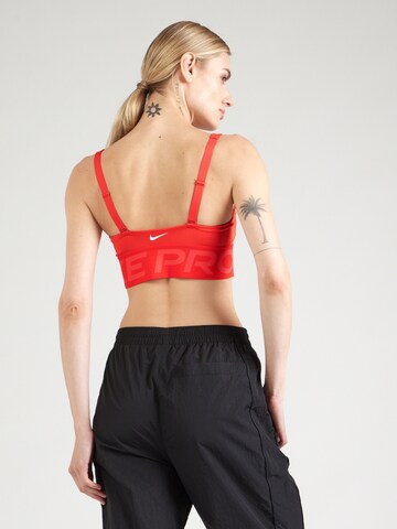 NIKE Bustier Sportmelltartók 'INDY PLUNGE' - piros