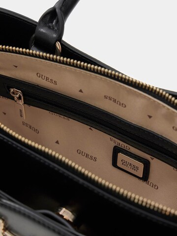 Borsa a mano 'Janie' di GUESS in nero