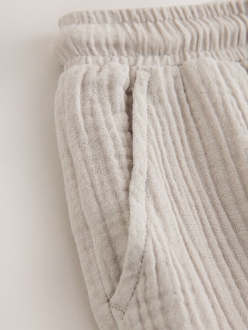 Next Normální Kalhoty – béžová