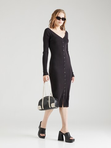 Robes en maille Calvin Klein Jeans en noir : devant