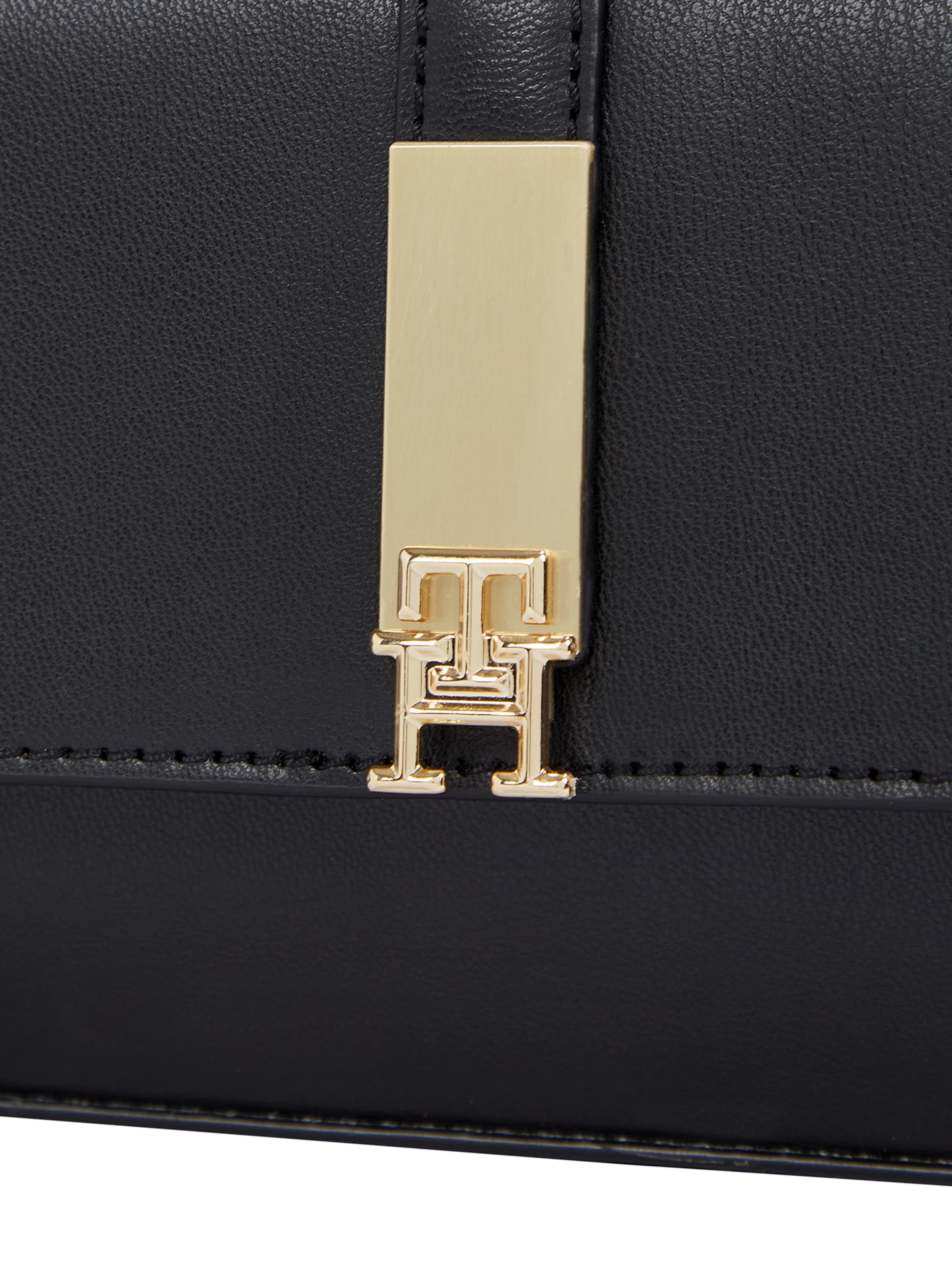 TOMMY HILFIGER Skuldertaske 'HERITAGE' i sort