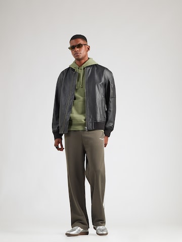 Champion Authentic Athletic Apparel Sweatshirt in Green