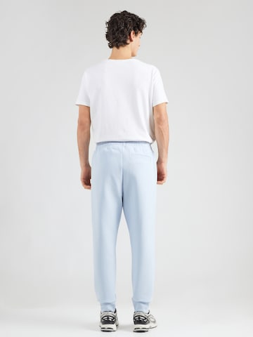 Effilé Pantalon 'Hadiko' BOSS Green en bleu : derrière