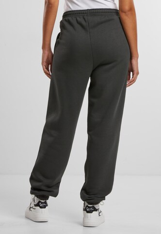 Tapered Pantaloni di Karl Kani in nero