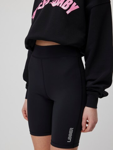 Skinny Pantaloni sport 'Anian' de la LeGer by Lena Gercke pe negru: față