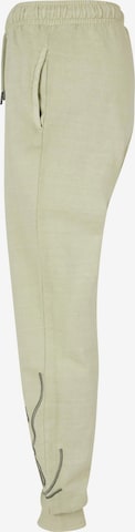 Tapered Pantaloni di Karl Kani in verde