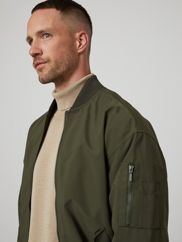 DAN FOX APPAREL Between-Season Jacket 'Kalle' in Green