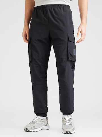 Tapered Pantaloni cargo di Champion Authentic Athletic Apparel in nero: frontale