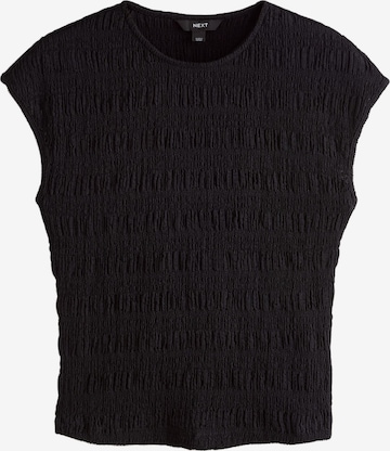 Next Blus i svart: framsida