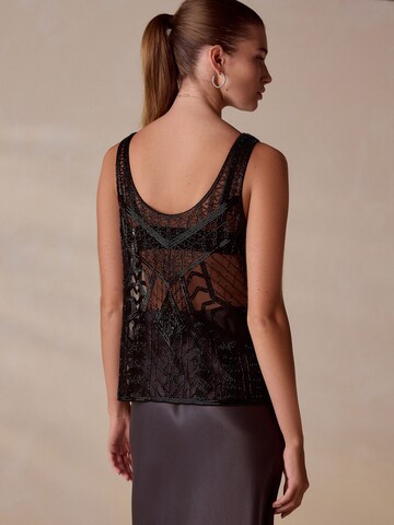 Next Τοπ σε μαύρο