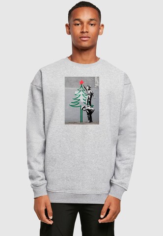 Sweat-shirt 'Banksy - Christmas Tree' Merchcode en gris : devant