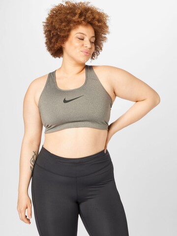 Regular Soutien-gorge de sport 'Swoosh' Nike Sportswear en gris : devant