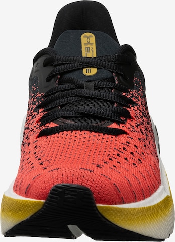 UNDER ARMOUR Running Shoes in Red